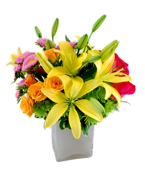 Hot pink roses, orange spray roses, yellow asiatic lilies, hot pink matsumoto asters and green button spray chrysanthemums in a cube vase.